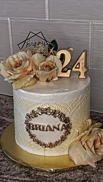 White and gold 24th birthday cake with dried roses